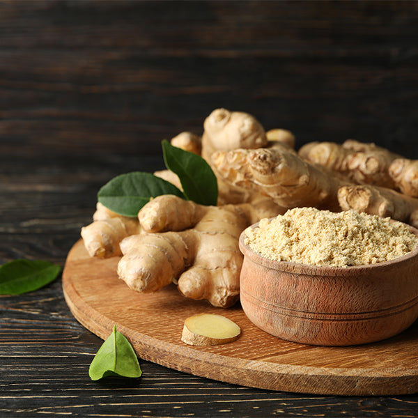 Fresh ginger and mango herb pack from Local Market, 0.25 kg, featuring vibrant ginger roots and ripe mango aroma in a tidy carton.