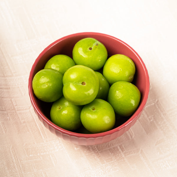 Fresh green sour plums from Local Market, 0.4 kg pack, showcasing vibrant green color and ripe, juicy fruit.