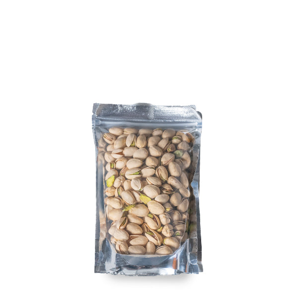 All-natural pistachios in a 0.25 kg pack from Fresh Nuts, showing green and beige shelled nuts on a white background.