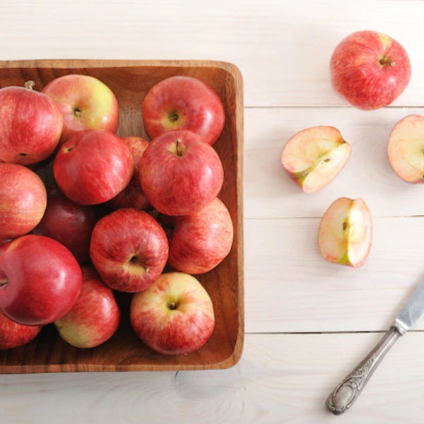 Royal Gala apples in a 4 kg carton by Sharbatly, fresh and crisp fruit displayed in a clear image.