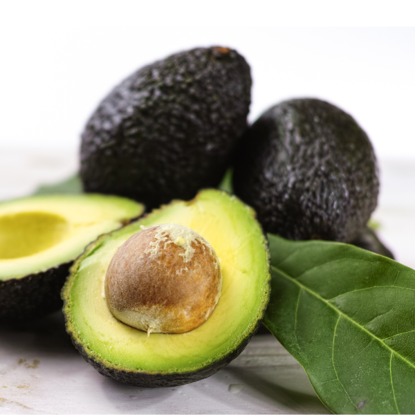 Fresh Hass avocados from Kenya in a 1 kg pack, showcasing ripe, green fruits with smooth skin ready for eating.